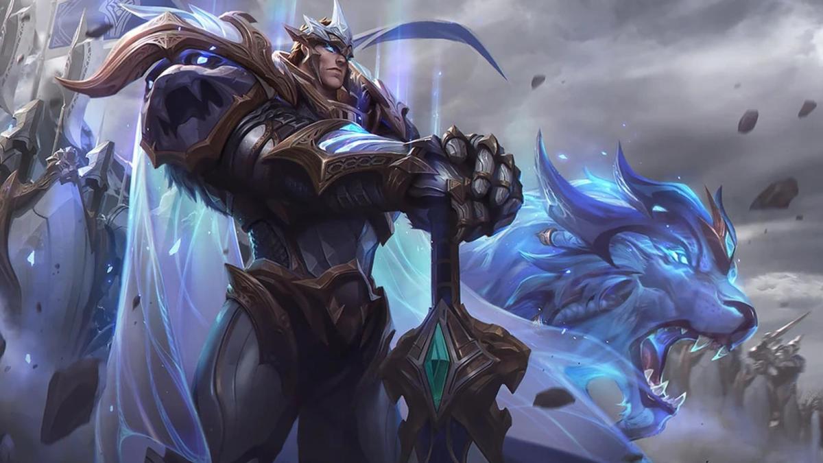 God King Garen stands with his sword pledged into the ground in a blue and white armor set in League of Legends.